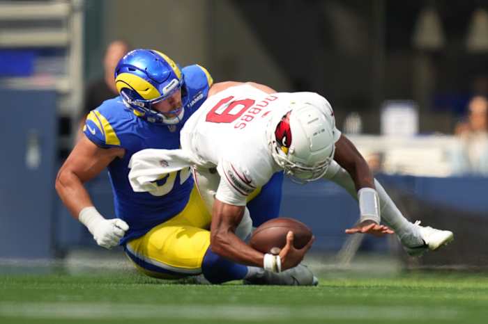 October 15, 2023; Inglewood, California, USA; Los Angeles Rams defensive end Jonah Williams (92) sacks Arizona Cardinals quarterback Joshua Dobbs (9) during the first quarter at SoFi Stadium. Mandatory Credit: Kyle Terada-USA TODAY Sports